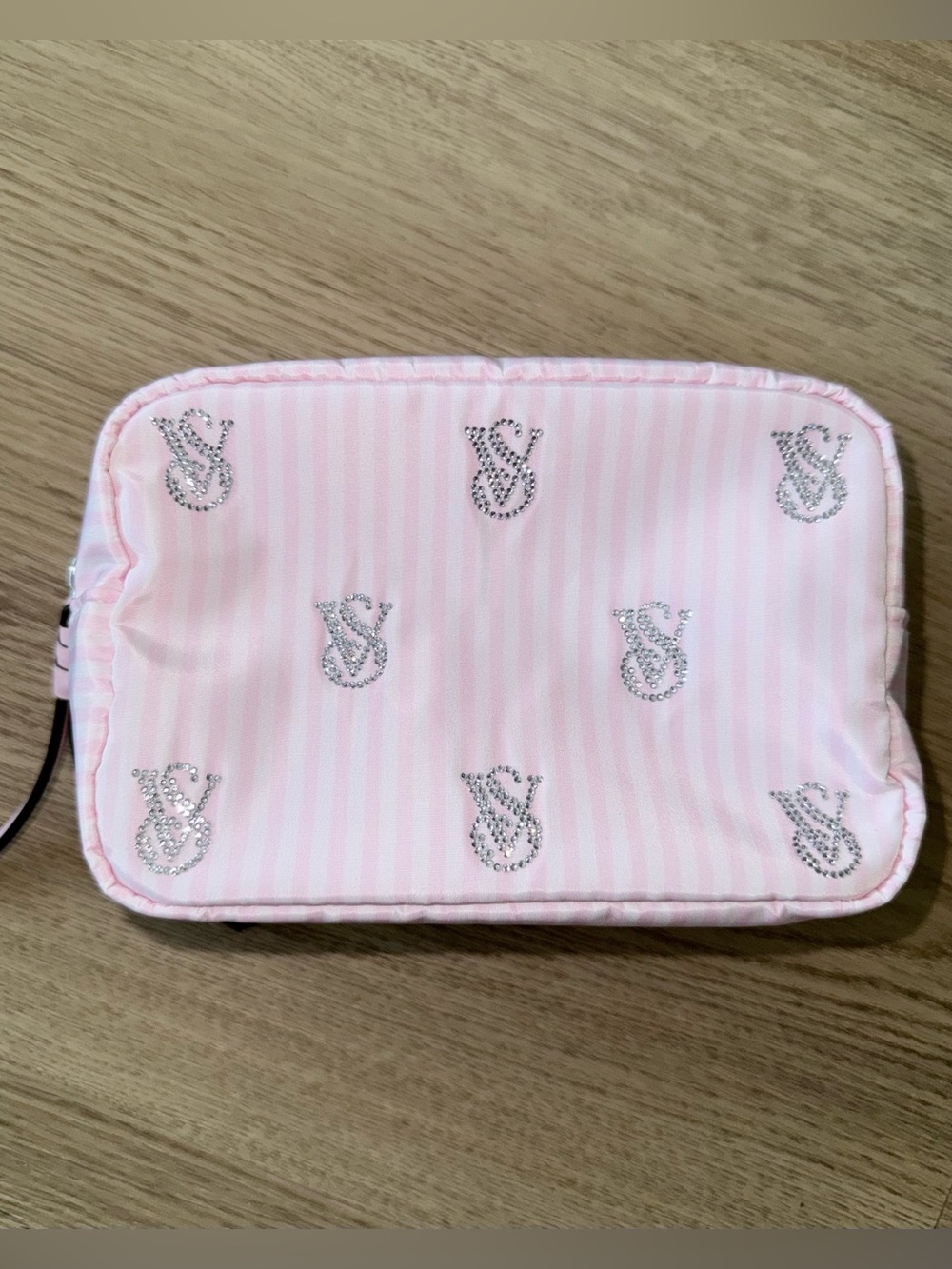 Victoriaโs Secret pink striped and rhinestones makeup bag